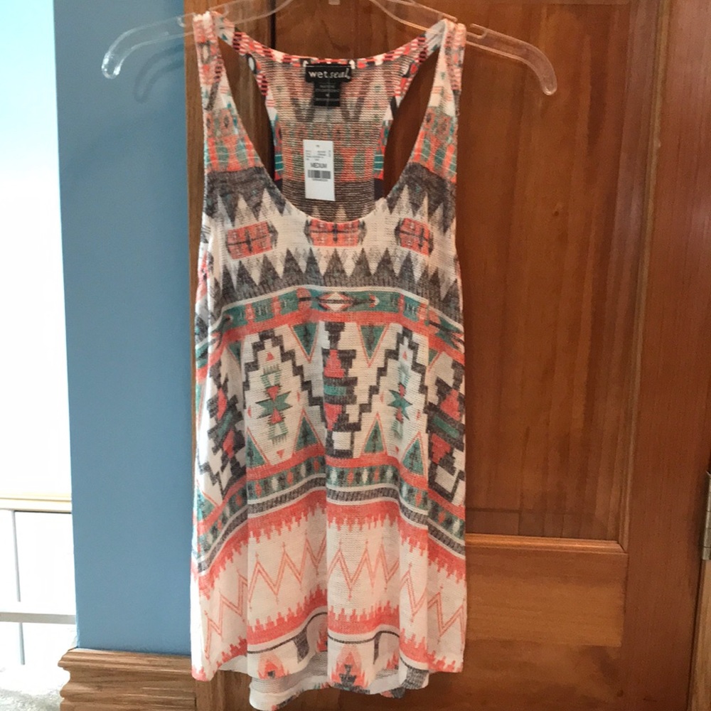 Medium tank. Never been worn with tags